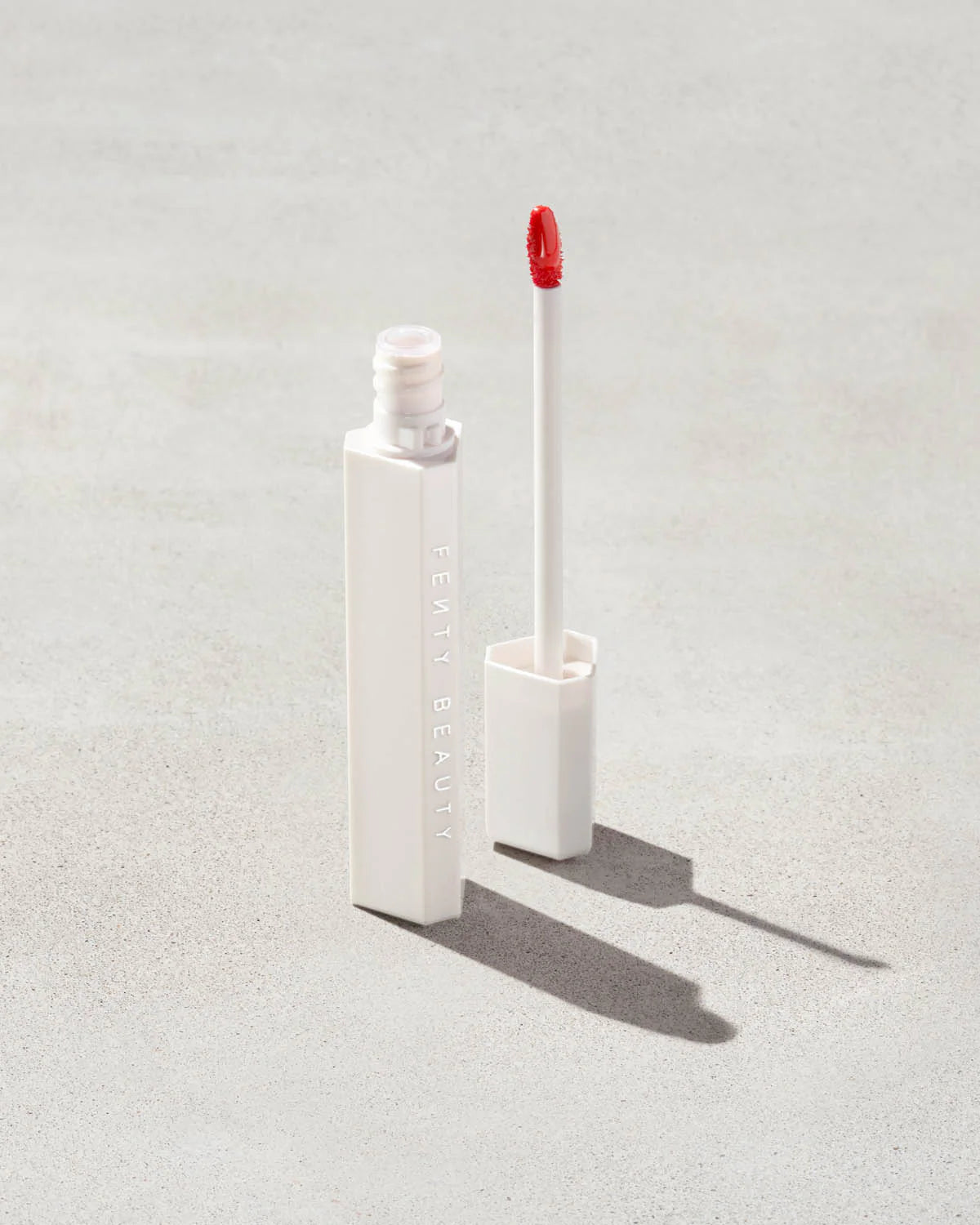 FENTY BEAUTY POUTSICLE HYDRATING LIP STAIN- ZESTY BESTY